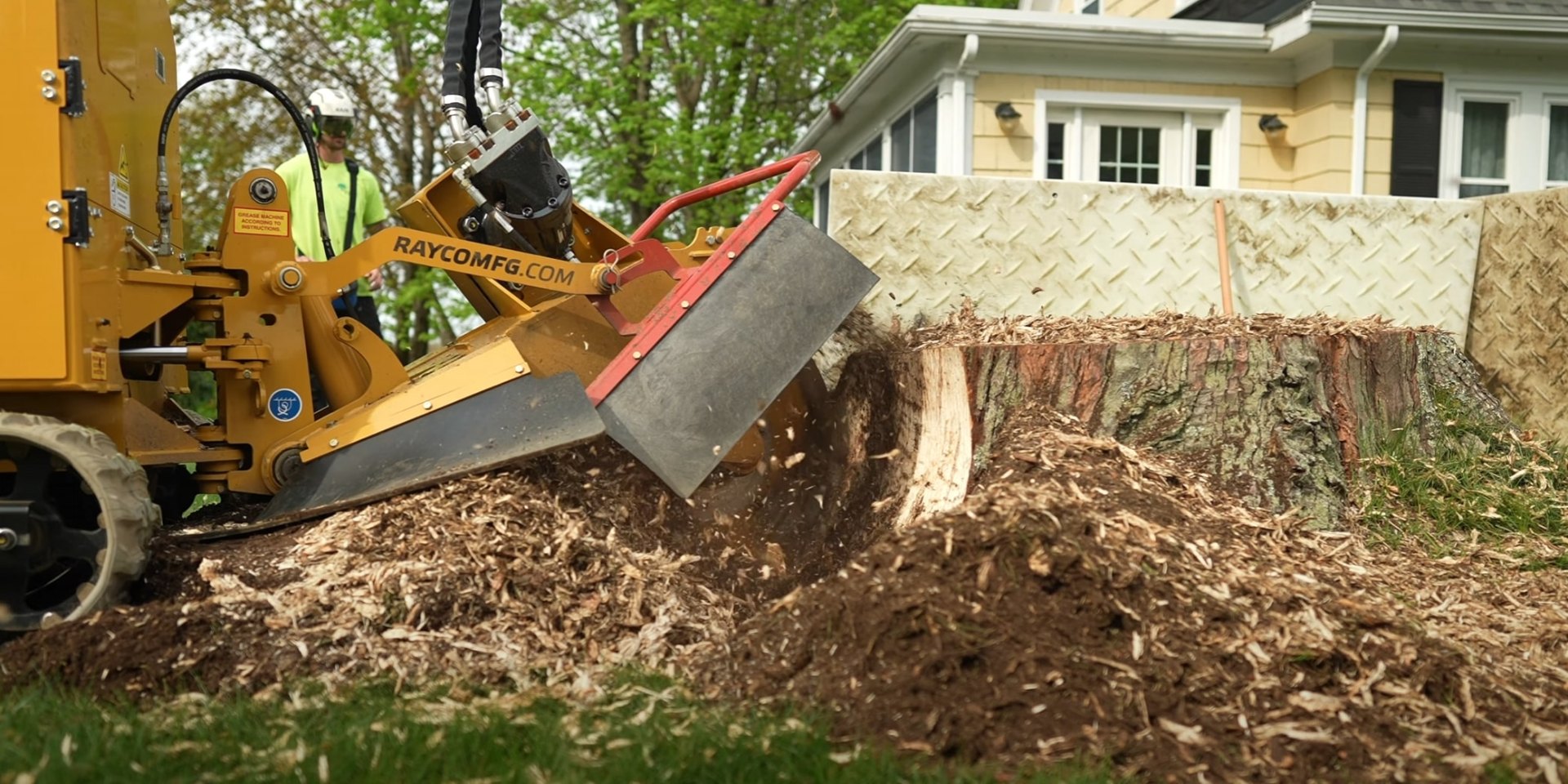 Professional stump grinding equipment in action for complete tree removal